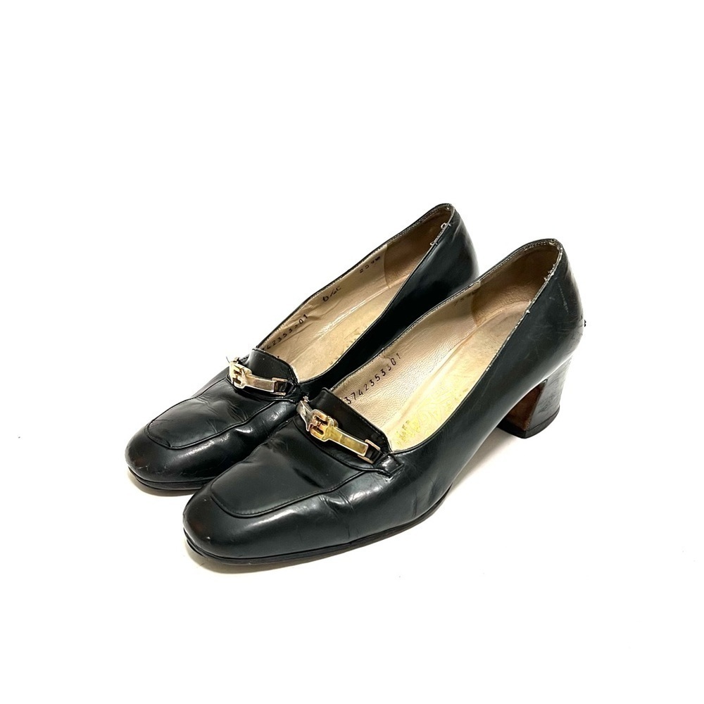 FERRAGAMO | Vintage 1990s black leather logo horsebit heeled loafers